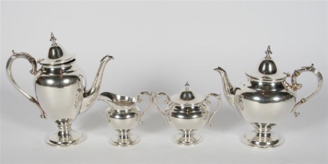 Henry Birks & Sons (Canadian), Sterling Tea Set: Henry Birks & Sons (Canadian, est. 1879). Sterling silver, bone. c. 1963/64. Style No. 66. Large teapot: Height: 10". Smaller teapot: Height: 9 1/4". Sugar bowl: Height: 6". Creamer: Height: 4 1/2". H