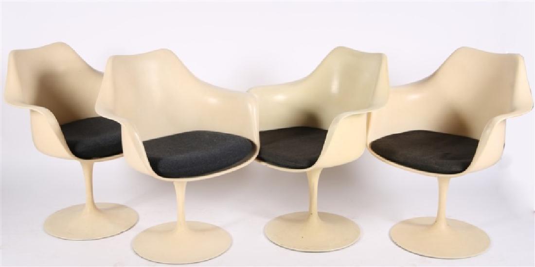 Set of Four Eero Saarinen for Knoll Tulip Chairs: Eero Saarinen (Finnish-American, 1910-1961). Set of Four Pedestal Arm Chairs. Aluminum, plastic, upholstery. Design: 1957, c. 1974. Manufactured by Knoll. Model #150. Height: 31 1/2", Length: 24 1/2",