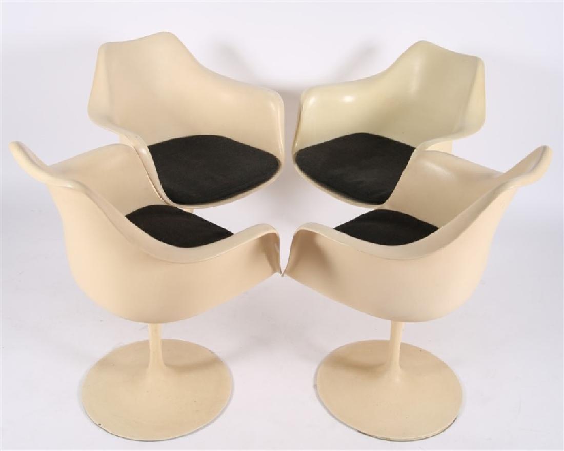Lot of Four Eero Saarinen for Knoll Tulip Chairs: Eero Saarinen (Finnish-American, 1910-1961). Set of Four Pedestal Arm Chairs. Aluminum, plastic, upholstery. Design: 1957, c. 1974. Manufactured by Knoll. Model #150. Height: 31 1/2", Length: 24 1/2",