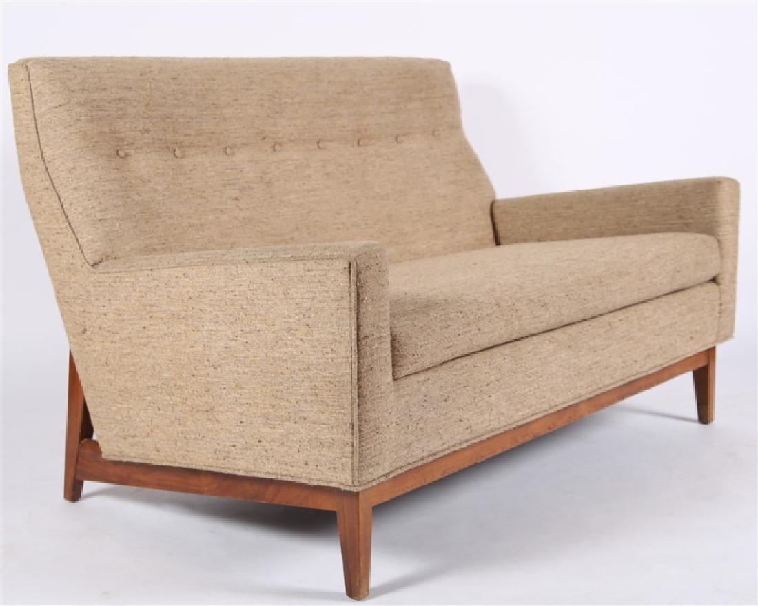 Style of Edward Wormley, Upholstered Settee: Upholstery, wood. Height: 32 1/4", Length: 52", Depth: 30 1/2". Upholstered mid-century modern settee in the style of Edward Wormley for Dunbar. One removable seat cushion. Eight upholstery buttons to