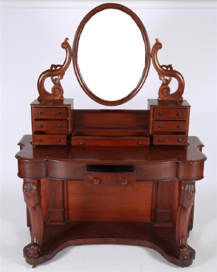 Mahogany Dressing Table with Swing Mirror: Mahogany. Height: 62" approx. with mirror, Length: 48", Depth: 21". Mahogany dressing table with swing mirror. Total of eight drawers: three to each side on table top, one to center underneath mirror,