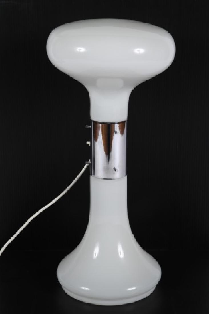 Carlo Nason (Italian), Double-Sided Glass Lamp: Carlo Nason (Italian, b. 1935). Glass, steel. c. 1960s-70s. Distributed by Mazzega. Height: 21 1/2", Width: 7 3/4". Double-sided mushroom table lamp with chrome center. Functional, but bottom bulb doe