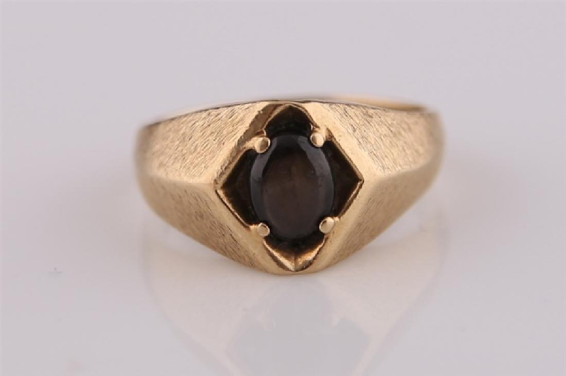 10kt Yellow Gold Ring with Brown Stone: 10kt yellow gold ring with oval brown stone in center. Brushed gold finish to half of ring. Interior band marked P-10K". Size: 10 1/4. Weight: 6.1 g.