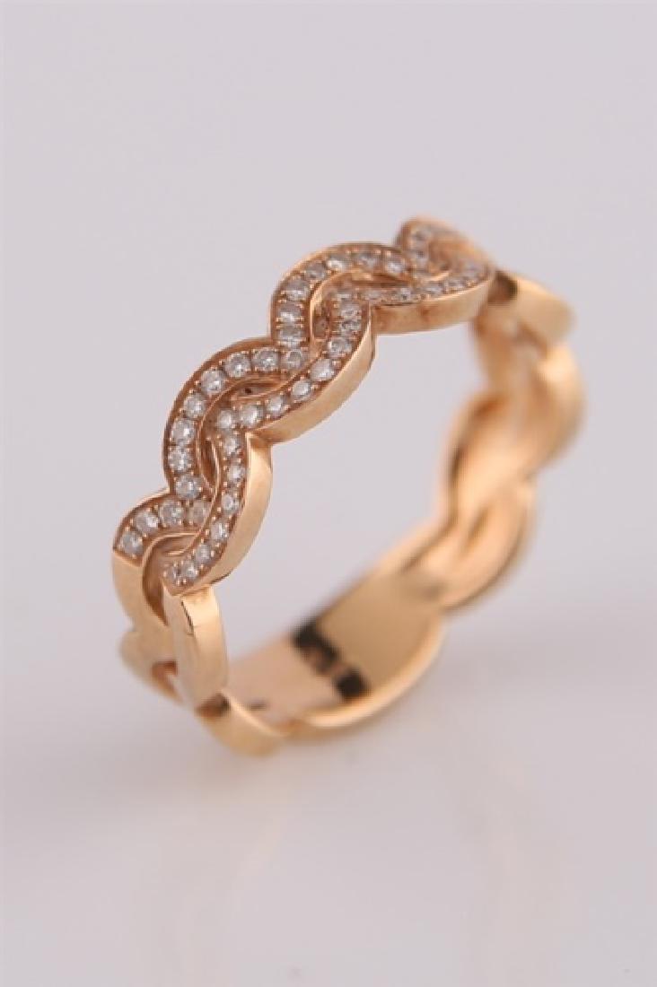 18kt Rose Gold Ring with Diamond Clusters: 18kt rose gold ring with diamond clusters. Sixty-two (62) diamonds totaling approx. .3 cts. Interior of band marked "18kt". Size: 6 3/4. Weight: 4 g.