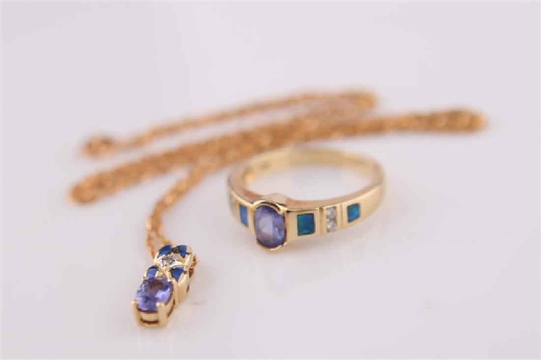 14kt LeVian Yellow Gold, Opal Necklace and Ring: 14kt yellow gold, opal, faux-diamond and tanzanite or iolite necklace by LeVian Jewelers. Pendant marked "14k LeVian". Necklace clasp marked "14k ITALY". Length: 18". Weight: 2.8 g. Matching 14kt yell