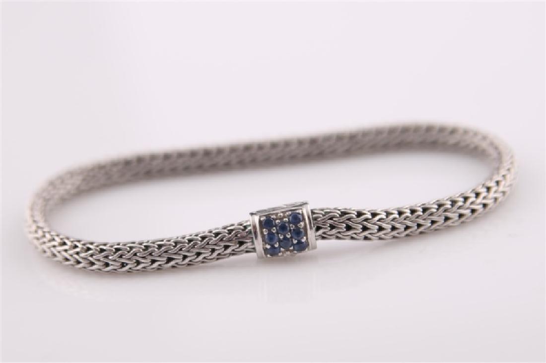 925 John Hardy Snake Chain Bracelet with Sapphires: 925 sterling silver John Hardy snake chain bracelet with sapphires. Eight (8) sapphires approx. .4 ct. Marked "950" and with maker's mark to clasp. Length: 7 1/2". Weight: 16 g.