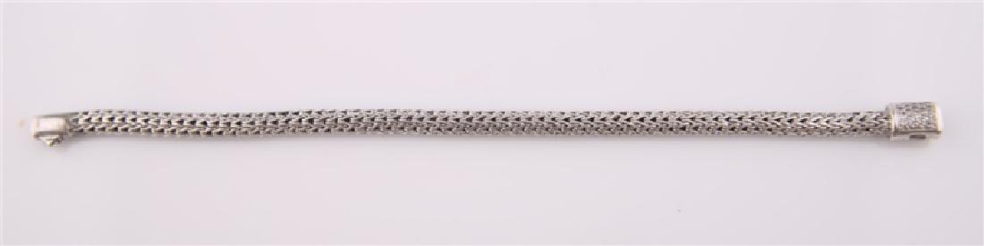 925 John Hardy Chain Bracelet with Diamonds: John Hardy, 925 snake chain bracelet with diamonds. Twenty-three (23) diamonds totaling approx. .15 cts. Clasp marked "925 18k". Length: 7". Weight: 15.1 g.