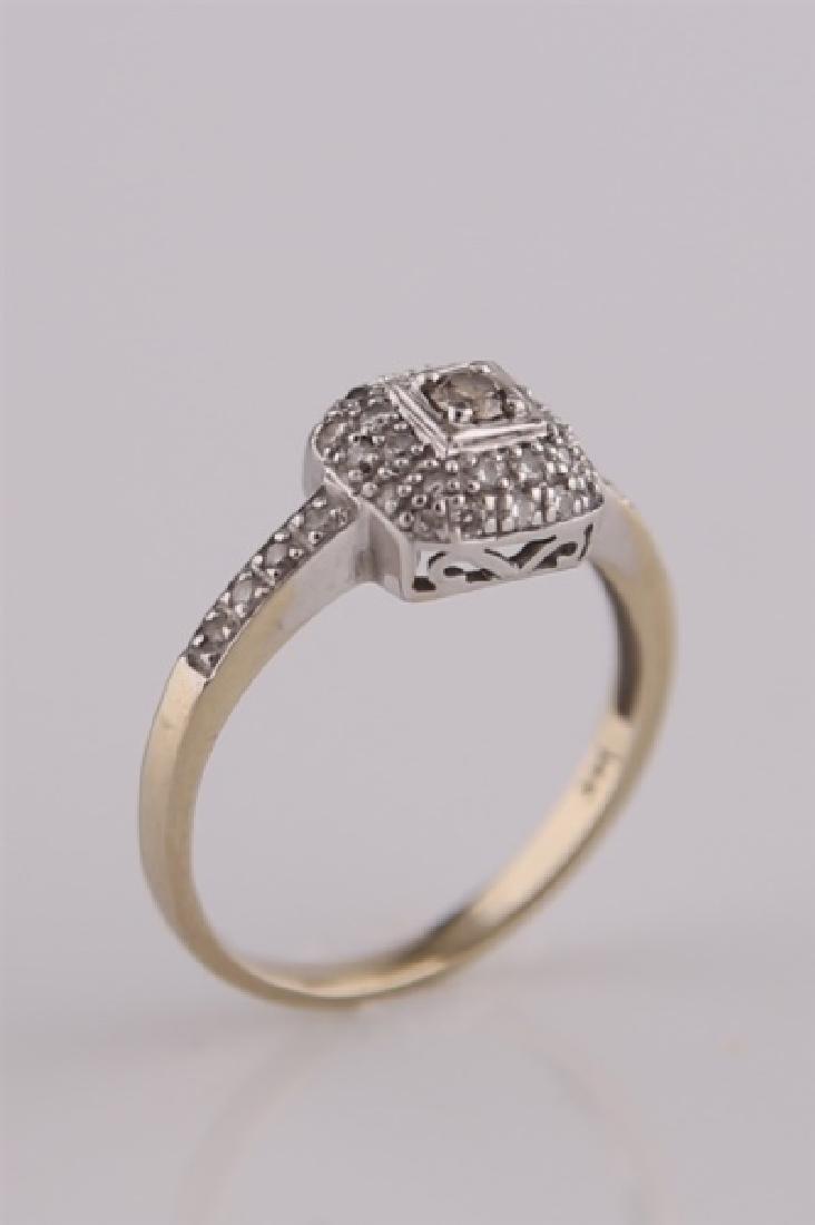 14kt White Gold and Diamond Cluster Ring: 14kt yellow gold and diamond cluster ring. Thirty-seven (37) diamonds totaling approx. .22 cts. Size: 5 1/2. Weight: 2.3 g.