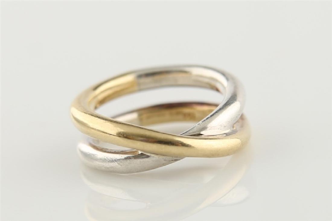 Tiffany & Co., Paloma Picasso Ring: Tiffany & Co., Paloma Picasso, 18k yellow gold and sterling silver bypass ring. All correct stamps are present. Ring Size: 5 3/4", Weight: 9g