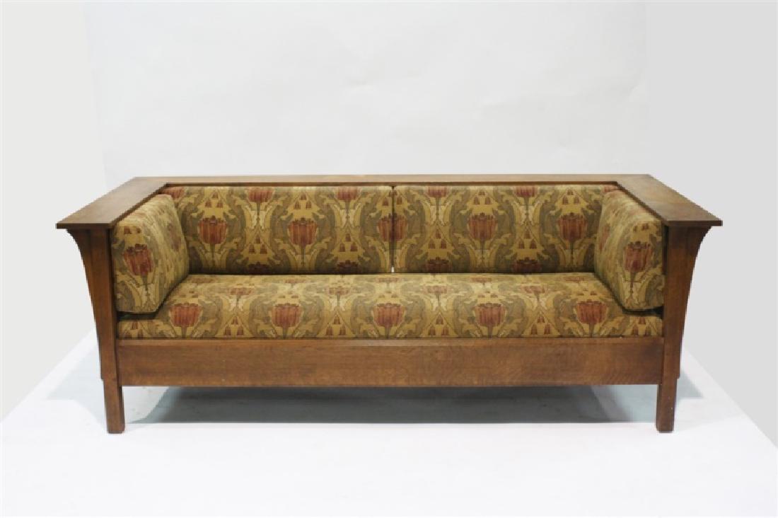 L & J.G. Stickley, Upholstered Settle: L. & J.G. Stickley (American, est. 1900). Prairie Spindle settle. Wood, upholstery. c. late-20th century to early 21st century. Height: 29 1/2", Length: 84 1/2", Depth: 37 1/2". Stickley Prairie Spind