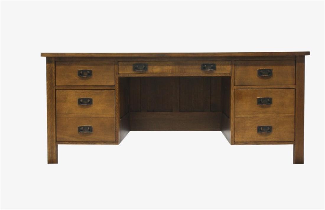 L & J.G. Stickley, Oak Executive Desk: L. & J.G. Stickley (American, est. 1900). Executive desk. Oak, copper hardware. Model 89-2266. Height: 30 1/2", Length: 65 1/2", Depth: 33". Stickley oak executive desk. Five drawers with dark copper