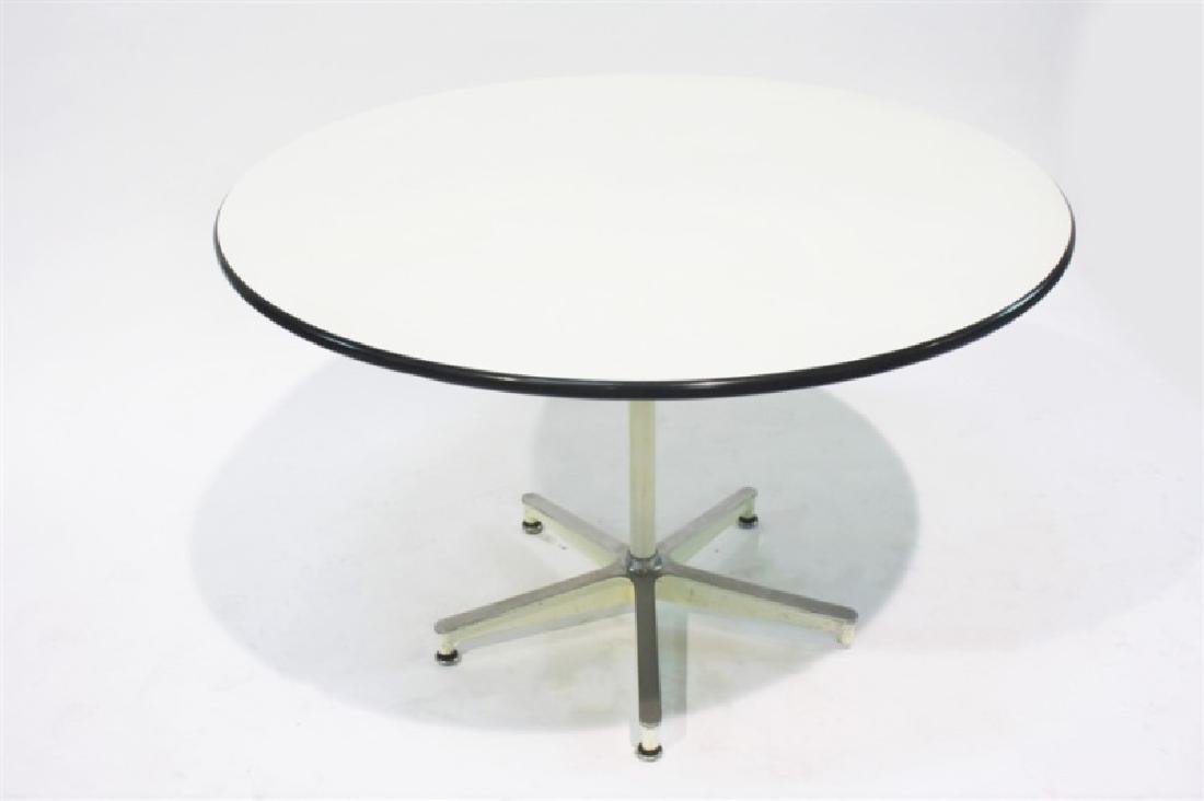 Eames for Herman Miller, 650 Dining Table: Charles Eames (American, 1907-1978), and Ray Eames (American, 1912-1988). Metal base, laminate top, enameled aluminum. c. 1950s. Manufactured by Herman Miller. Model: 650. Height: 29 1/2", Dia.: 45 1/