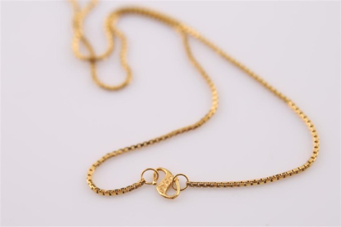 21kt Yellow Gold Thai Baht Chain Necklace: 21kt yellow gold Thai Baht chain necklace. Marked "21ct DJ" to clasp. Length: 18". Weight: 8.3 g.