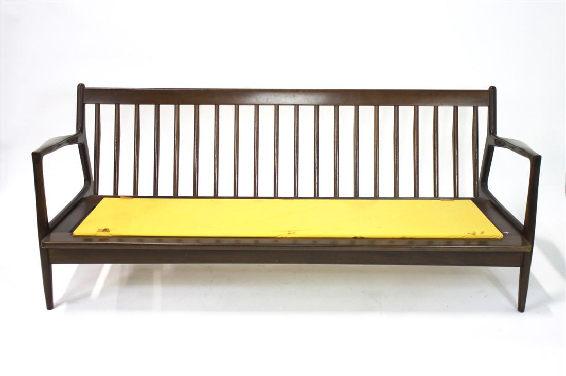 Selig, Danish Modern Sofa: Selig Manufacturing Co. Wood, upholstery. Height: 27", Length: 69", Depth: 29 1/2". Sofa bench with flared arms. Sofa has original Selig button tag: "Made and finished in Denmark. Imported by Selig".