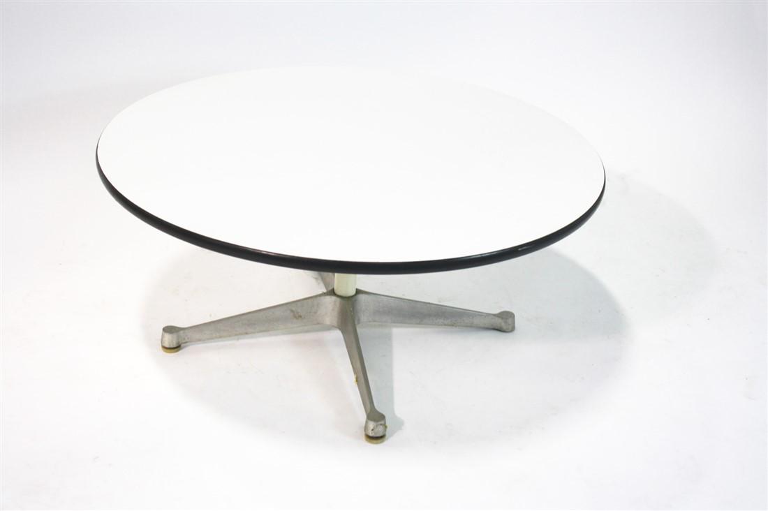 Eames for Herman Miller, Round Coffee Table: Charles and Ray Eames (American, 20th C.). Wood, metal, plastic. Manufactured by Herman Miller. Model: 651. Height: 16 1/4", Dia.: 36". Low coffee table with plastic material top. Metal base. White pa