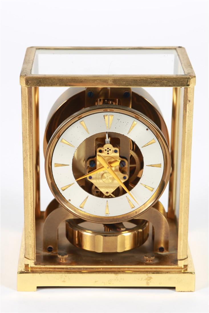 Jaeger-LeCoultre, Brass Atmos Clock: Jaeger-LeCoultre (Swiss, est. 1833). Brass, glass. c. 1950s. Model: 526-5. Serial Number: 72290. Height: 8 3/4", Length: 7", Depth: 5 1/4". Jaeger-LeCoultre Atmos Clock with lever-activated mechanism 