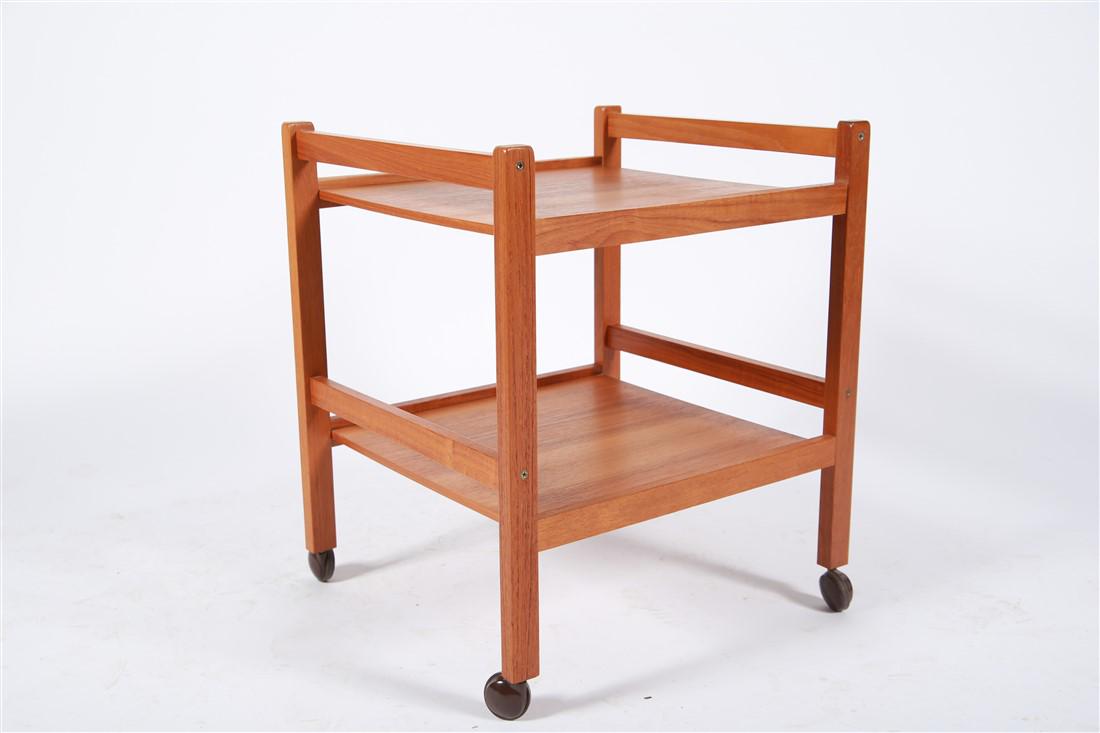 Danish Modern Rolling Cart: Teak. Height: 23 5/8", Width: 20", Length: 18 11/16". Danish modern teak two tier rolling cart on black plastic casters.