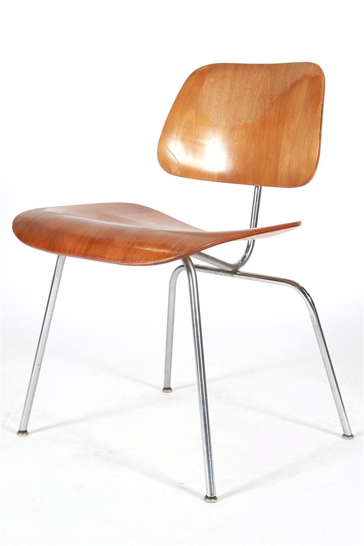 Eames For Herman Miller, LCM Chair: Charles Eames (American, 1907-1978) and Ray Eames (American, 1912-1988). Side chair. Walnut plywood, chromed steel, and rubber. Design: 1946. Manufactured by Herman Miller. Model: LCM Height: 29", Len