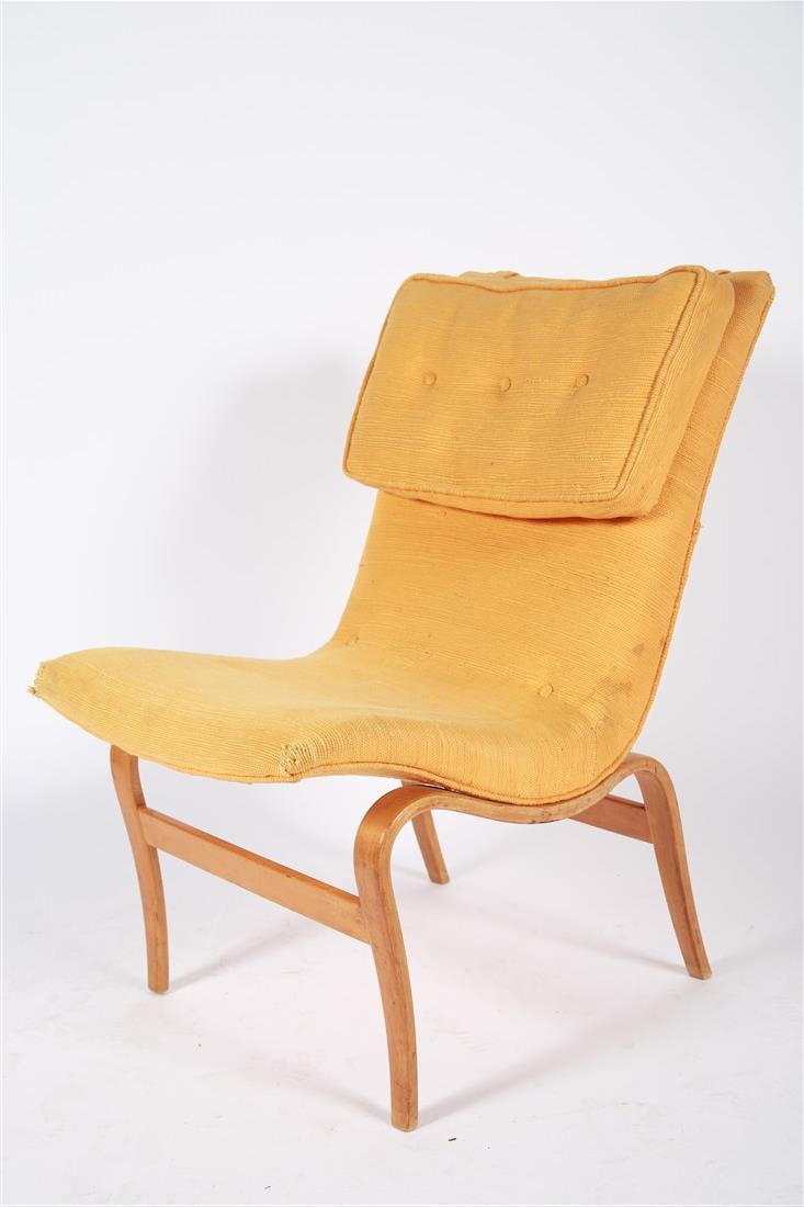 Bruno Mathsson, Yellow "Eva" Lounge Chair: Bruno Mathsson (Swedish, 1907-1988). Armless Eva chair. Beech wood, upholstery. Design: 1941. Distributed by Firma Karl Mathsson. Model: 471. Height: 32", Length: 19", Depth: 29". Armless "Eva" lounge