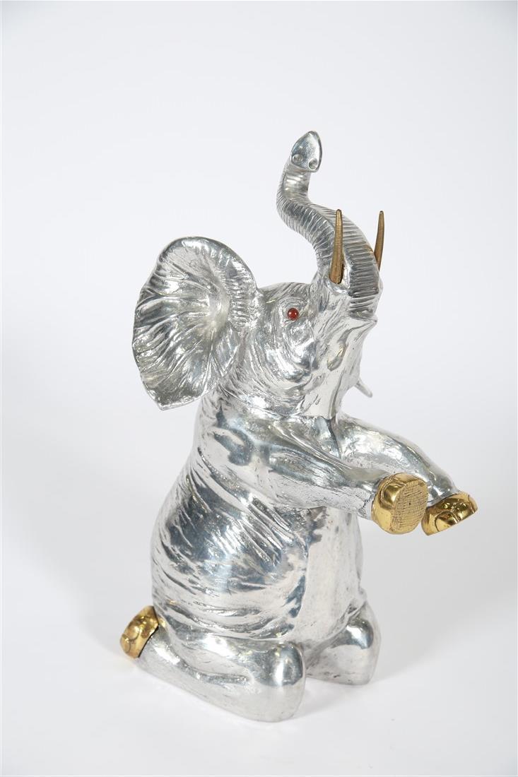 Arthur Court, Aluminum Elephant Wine Cooler: Arthur Court Designs (American, est. 1966). Aluminum alloy, brass, glass. 1986. Height: 22", Length: 9 1/2", Depth: 9 1/2". Aluminum alloy elephant wine or champagne cooler with carnelian colored eyes