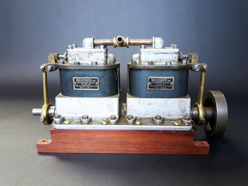 H.E. Boucher S-64 4-Cylinder Engine: H.E. Boucher Mfg. Co. Brass, Steel, Wood. c. 1920s. S-644. 8" x 8.2" x 3".