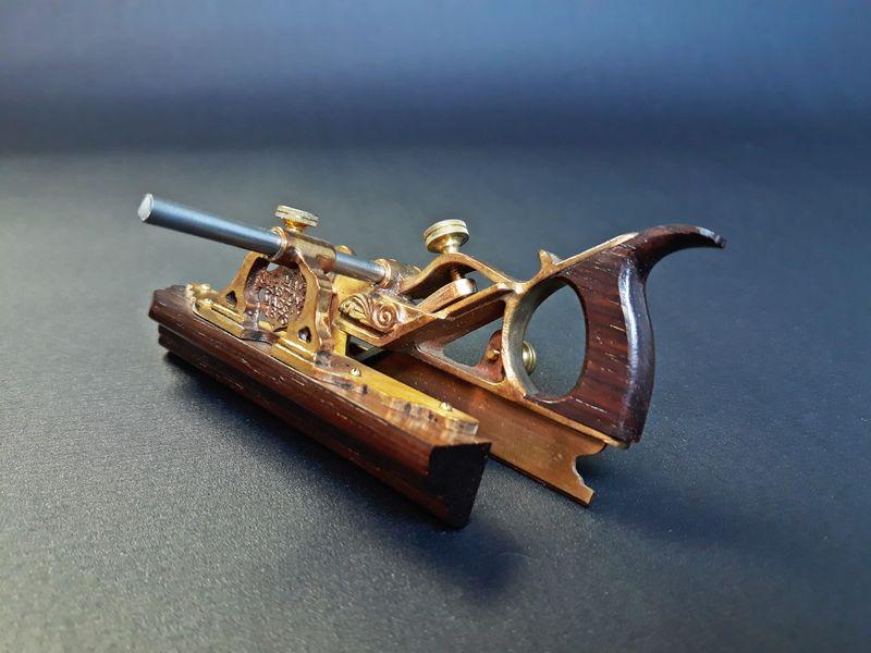 Miniature Mayo Patent Plow Plane: Paul Hamler. Wood, Steel, Brass. c. 1995 - 2005. 2.25" x 4.00" x 2.752.25" x 4.00" x 2.75".