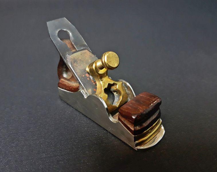 Miniature Smoothing Plane: Paul Hamler. Steel, Wood, Brass. c. 1995 - 2005. 1.5" x 2.25" x 0.75".