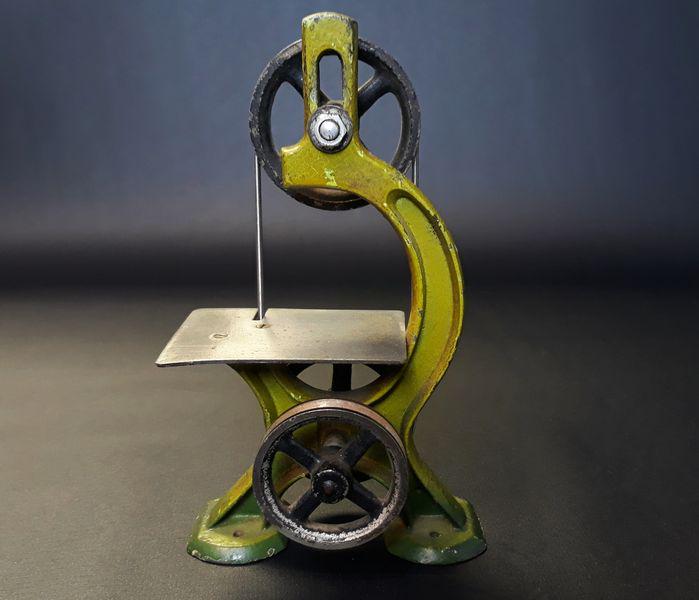 Marklin Miniature Band Saw: Marklin Toy Company. Cast Iron. c. 1940s (Pre-War). 6.25" x 3.5" x 2.25".