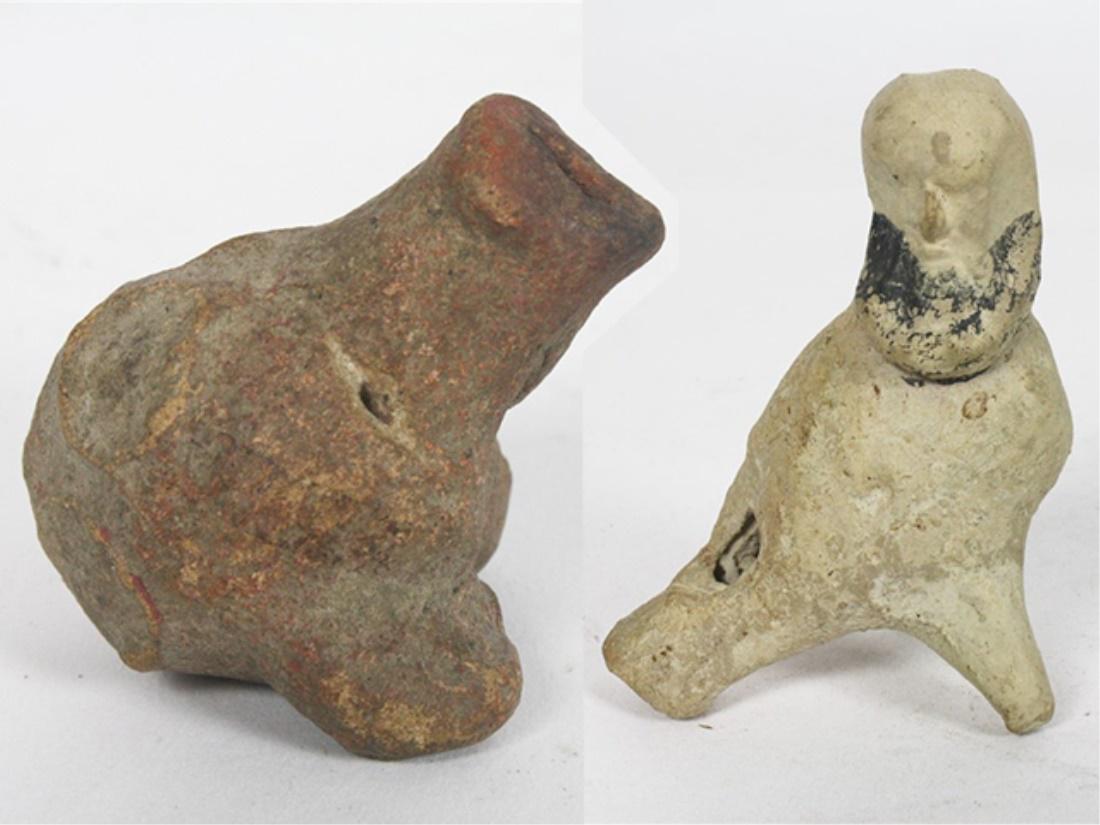 Pair of Attrib. Pre-Columbian Animal Whistles: Clay whistles. Height: 1 1/2", Length: 2", Depth: 2". Pair of Pre-Columbian attributed clay animal shaped whistles, possibly a bear and a bird with human head. Please note the dimensions: composite co