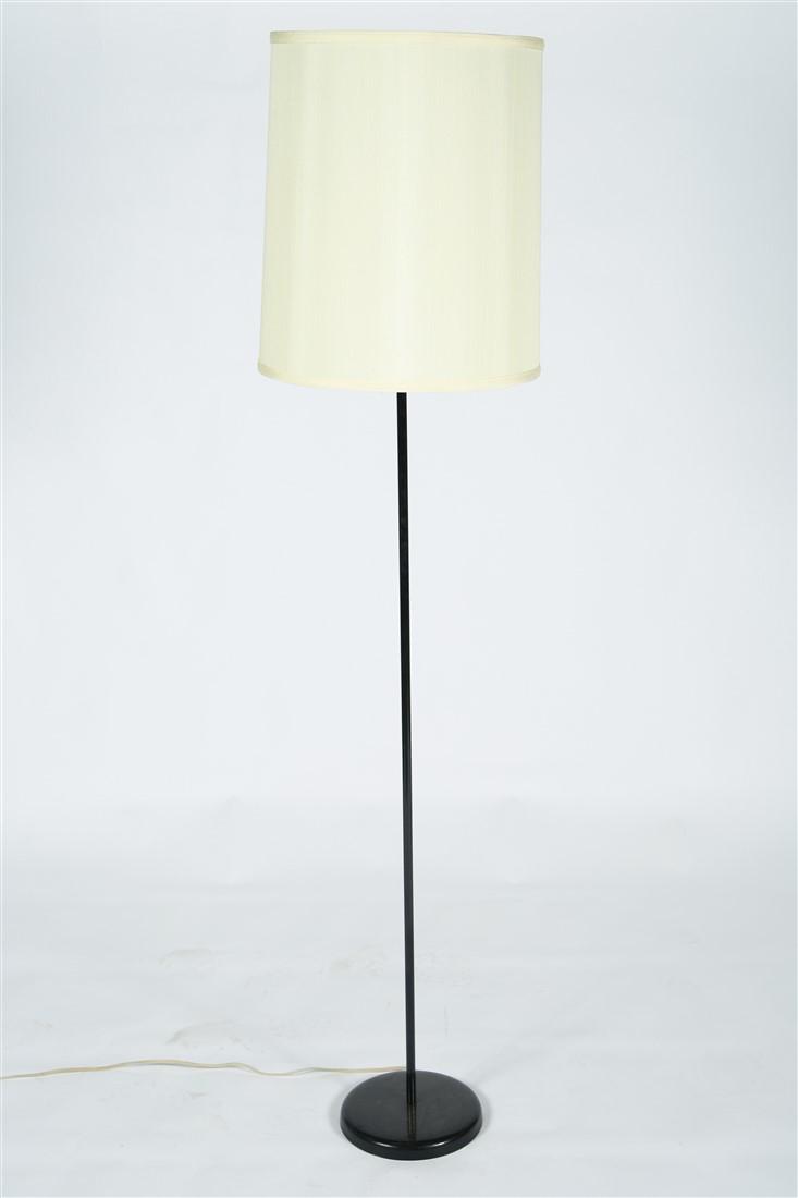 Black Painted Mid-Century Metal Floor Lamp: Floor lamp. Black painted metal. c. mid-20th century. Height: 56" (includes harp), Diameter: 7 1/2". Black painted metal floor lamp with fabric shade. Lamp does not appear to be marked or labeled. Lam