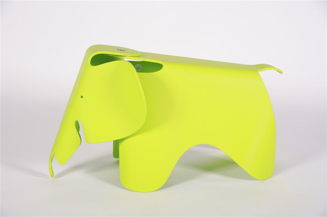 Vitra, Eames Green Elephant Stool: Vitra in collaboration with Eames Office. "Elephant". Molded plastic. Height: 16", Length: 31", Depth: 16 1/2". Collaboration with Eames Office. Charles and Ray Eames design plastic elephant in a gree