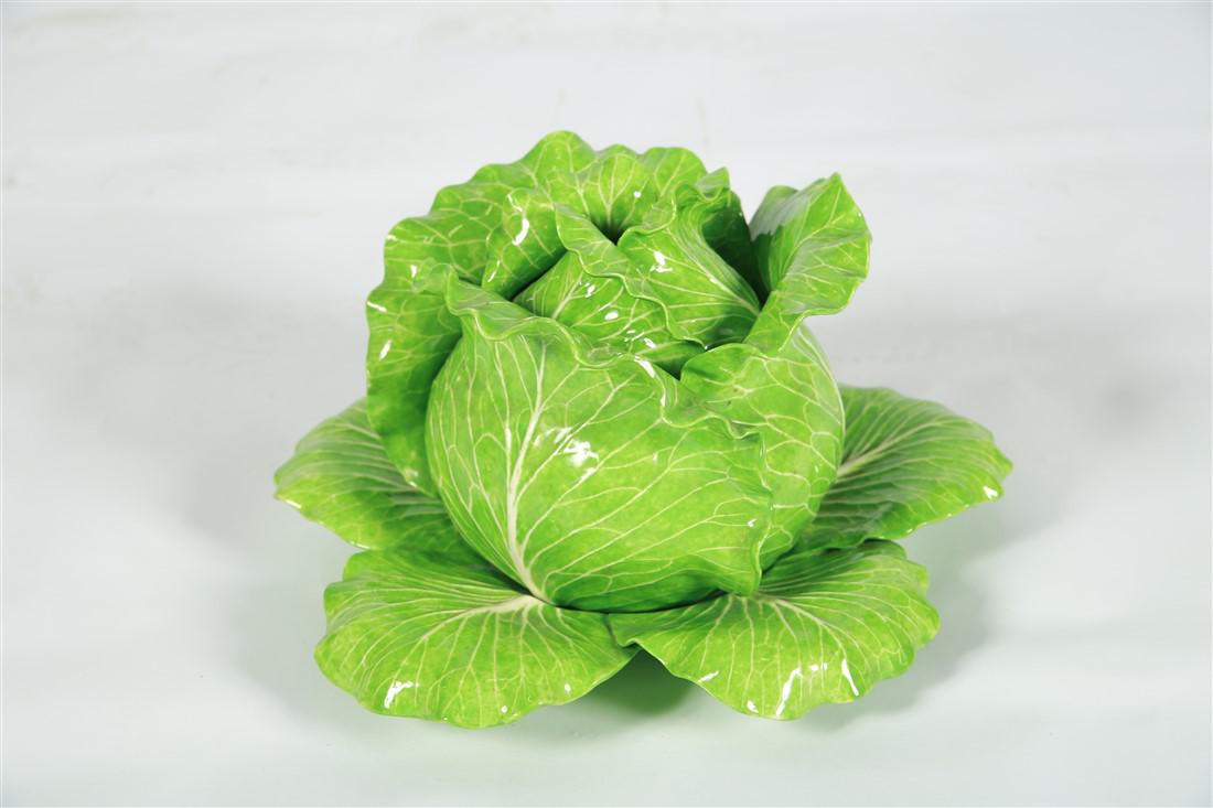 Dodie Thayer, Lettuce Ware Tureen and Underplate: Dodie Thayer (American, 1926-2018). Ceramic. c. 1991. Full set including plate height: 7 1/4", Length: 13 1/4", Depth: 13 1/4". Dodie Thayer lettuce ware tureen and underplate. Lettuce or cabbage desi