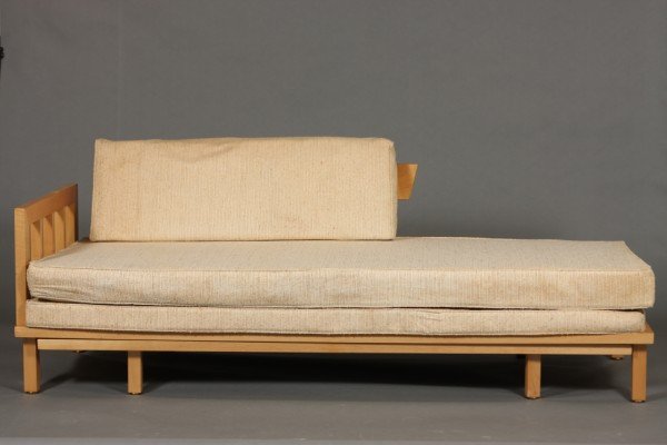 Mid 20th Century American Birch Day Bed: Possibly designed by Eliel Saarinen for Johnson Furniture Company. Rectangular frame with bracket end and back rest half the length of the back. With a lower frame that slides out. Length: 75". Condit