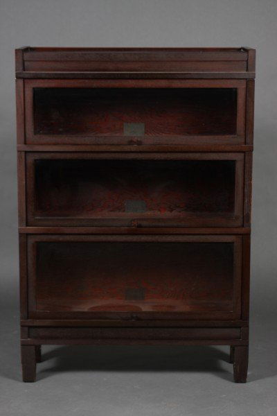 Barrister Bookcase, Globe Wernicke, 20th Century, 3: Oak, 1900-1940. Each shelf labeled with "Globe Wernicke, Sectional Bookcase, Made in Cincinnati." Dimensions H: 50 1/4" W: 34 1/2" D: 11" Condition: Appears fine, knob on base shelf needs to be re-att