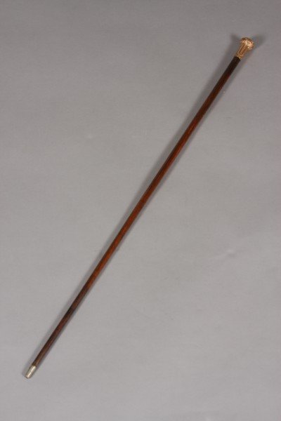 American Victorian Gold Filled Handled Walking Can: Together with an ivory and gold filled and ivory handled umbrella. Dimension: Umbrella L: 35 1/2" Condition: Silk on umbrella is worn, torn and damaged. Gold finish on handles is worn.