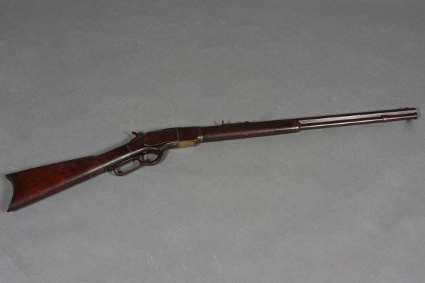 Winchester Model 1873 Rifle, Manufactured circa 18: Condition: Very good; the dust cover is missing, the magazine tube retainer is loose.(218xxxr)
