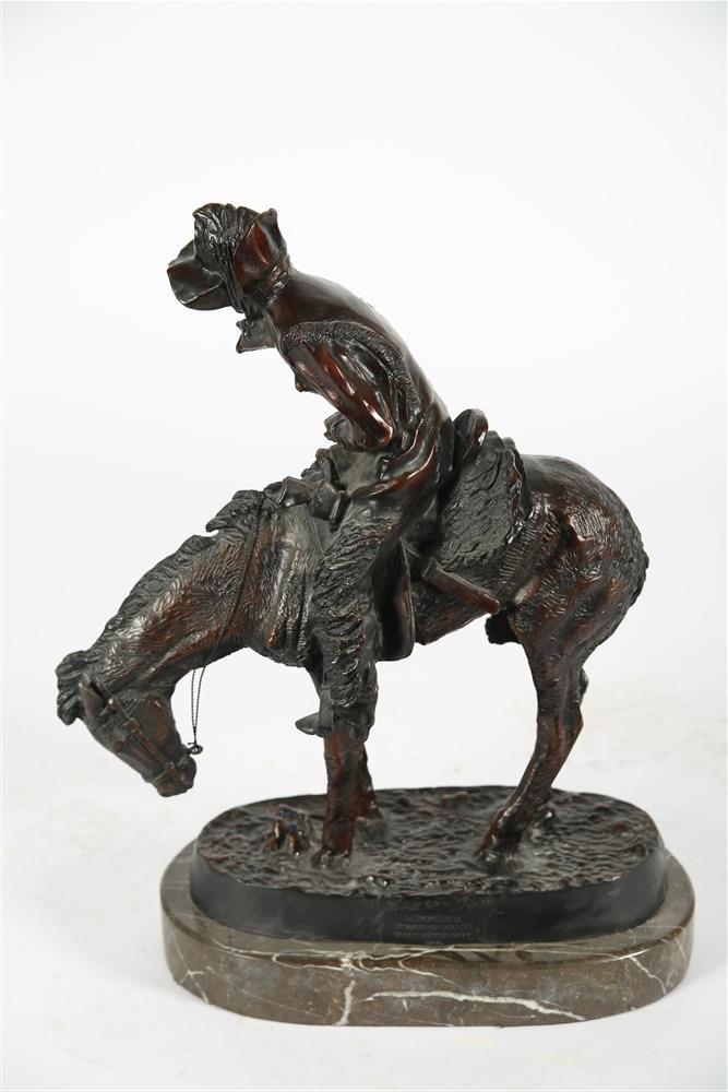 After Remington, "The Norther" Bronze Sculpture: After Frederic Remington (American, 1861-1909). "The Norther". Bronze, marble base. Height: 22 1/2", Length: 17 1/2", Depth: 10". All measurements include the marble base. After Frederic Remington, "T