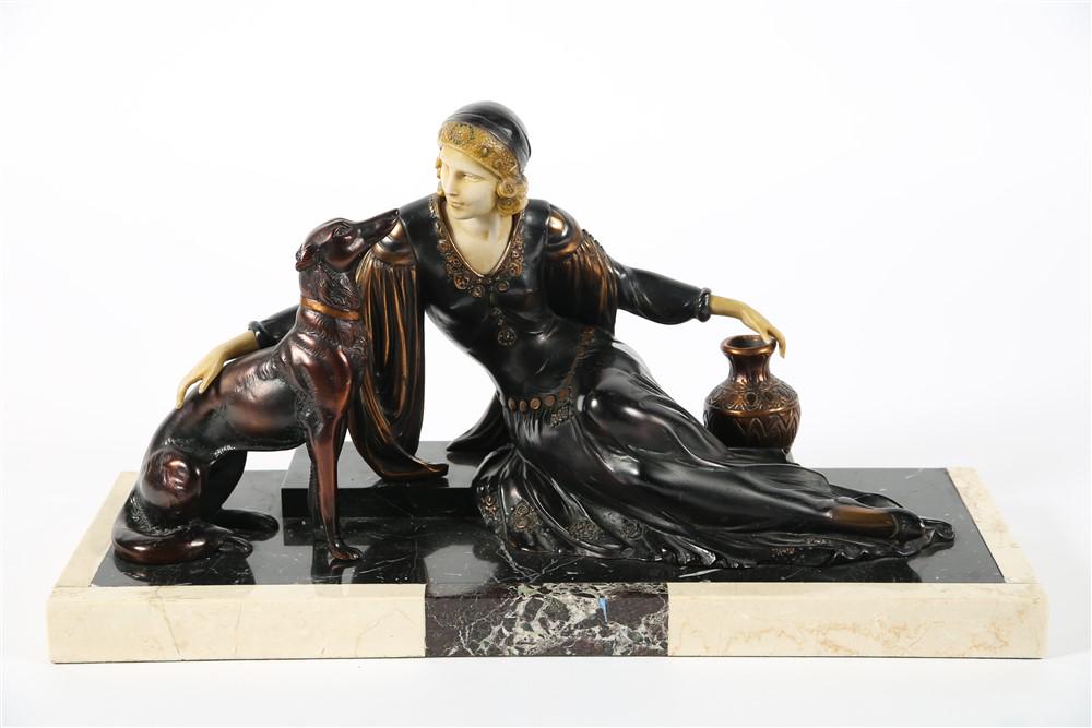 Art Deco Style French Spelter Sculpture: Spelter, celluloid, marble. Height: 12", Length: 22 1/2", Depth: 8 1/4". Figure of a lady in Art Deco era clothing with a dog mounted on a black and white marble base. Woman's face and hands appear to