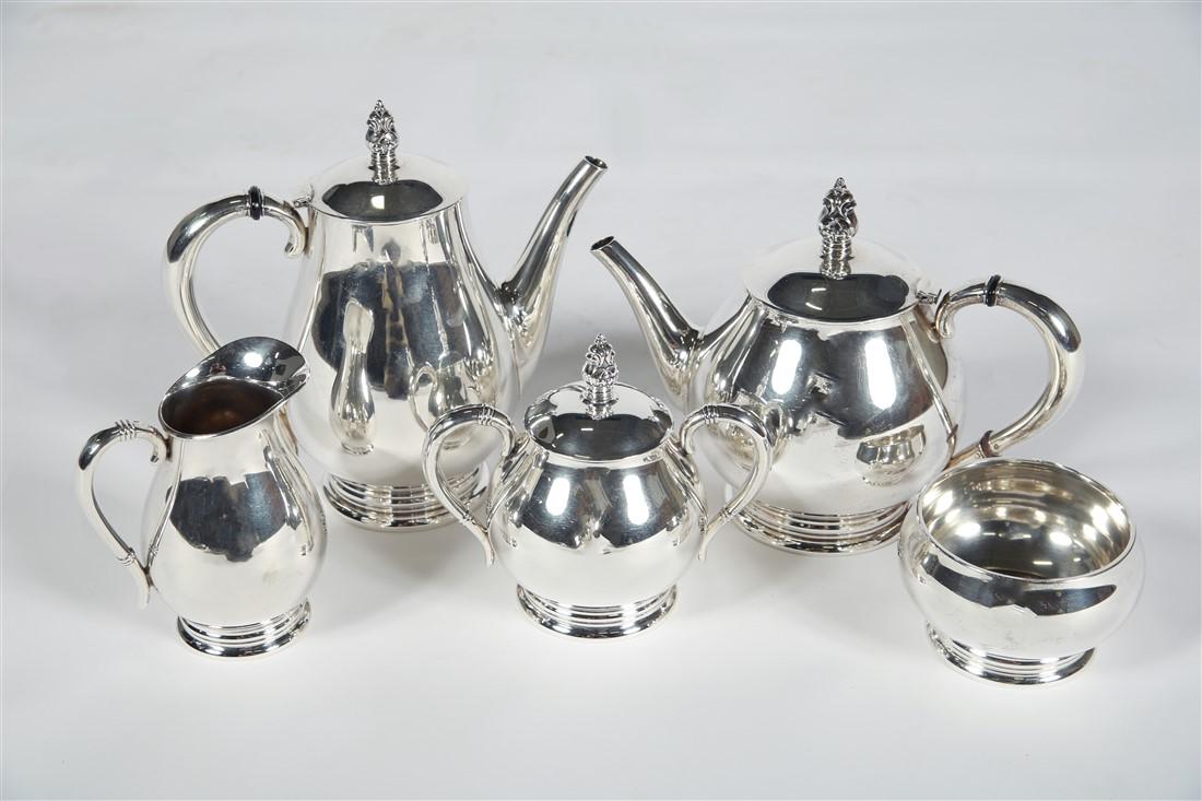 International Sterling, "Royal Danish" Tea Set: International Sterling. "Royal Danish" tea set. Sterling silver. Coffee pot height: 8 3/4". Tea pot height: 7 3/4". Creamer height: 5 1/2". Waste bowl height: 2 3/4". Total weight: approx. 77.53 ozt.