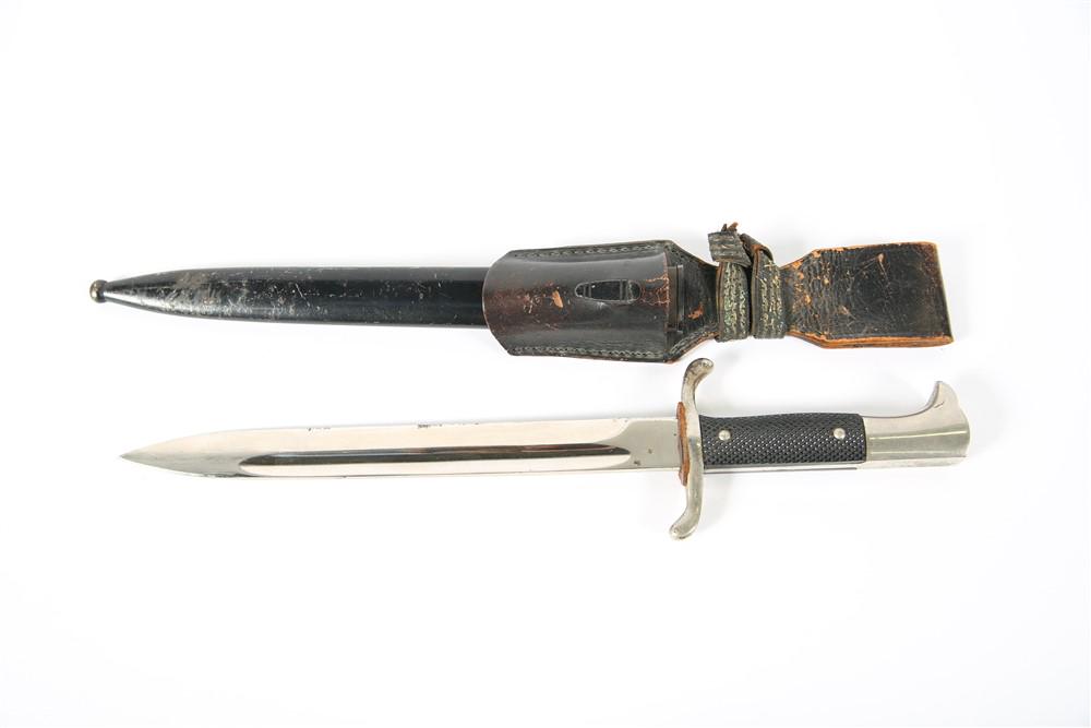 WWII-Era Carl Eickhorn German Dress Bayonet: WWII-era Carl Eickhorn German Firemanâ€™s Dress Bayonet. c. 1933-35. Length (without sheath): 14 1/2" from tip to base of hilt. Length (with sheath): 15 3/4". WWII-era Carl Eickhorn German dress 