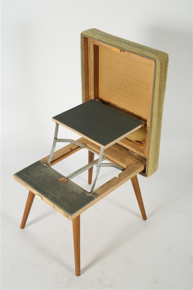 Cor, Convertible Ottoman Step Stool: Cor (German). Wood, upholstery, metal. c. 1950s-60s. Height: 15 1/4", Length: 22 1/4", Depth: 16". Ottoman by Cor that converts from a footstool to a step stool. Green textured upholstery, wood tapere