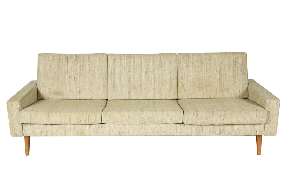 Co-Sitz Mid-Century Sofa Bed: Walnut, upholstery. c. mid-20th century. Height: 29 1/2", Length: 81", Depth: 29 1/4" (closed). Beige tweed upholstered sofa bed. Possibly by Cor Sitzmobel. One cushion labeled "Co-Sitz". Walnut taper