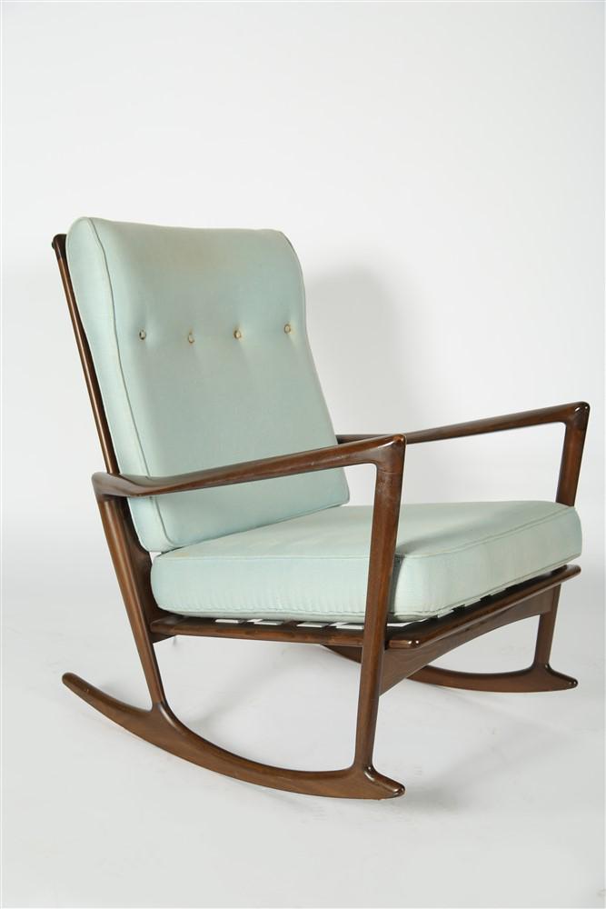 Ib Kofod-Larsen, Selig Rocking Chair: Ib Kofod-Larsen (Danish, 1921-2003). Beech with walnut stain, upholstery. c. mid-20th century. Imported by Selig. Height: 33 1/2", Length: 32 1/4", Depth: 20 1/2". Beechwood rocking chair with walnut