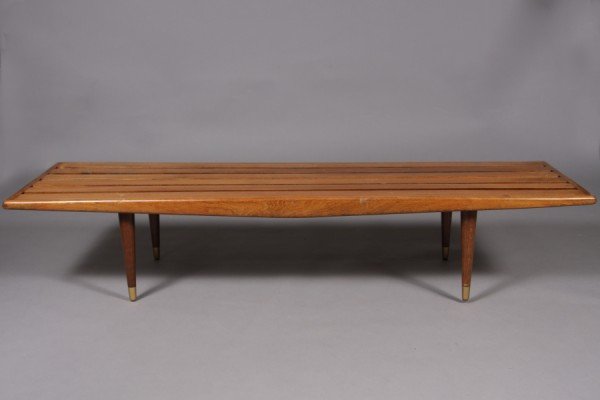 Mid-Century Birch Bench: Rectangular slat top on round tapering legs. H: 12", W: 60", D: 18 1/4". Condition: General wear.