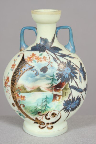 Victorian Enameled Opaline Glass Vase, Moon Flask: Fourth quarter 19th century. Moon flask form decorated with enameled lake landscape surrounded by floral border. H: 10". Condition: Appears fine.