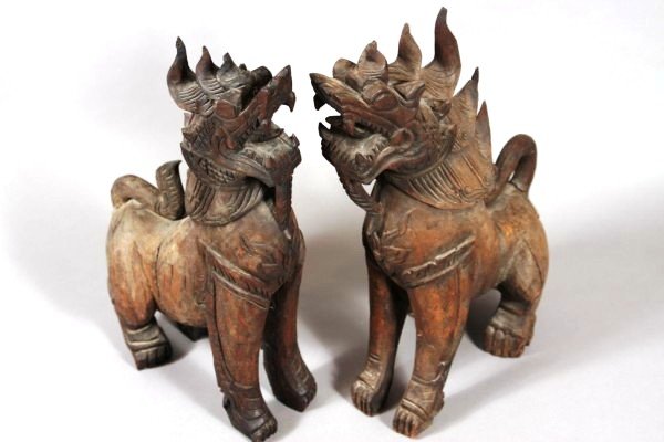 Pari of Foo Dogs, Carved Wood, Contemporary: Dimensions: H: 22" W: 5 1/2" D: 11 1/4" Condition: Some Wear And Cracks In Wood.