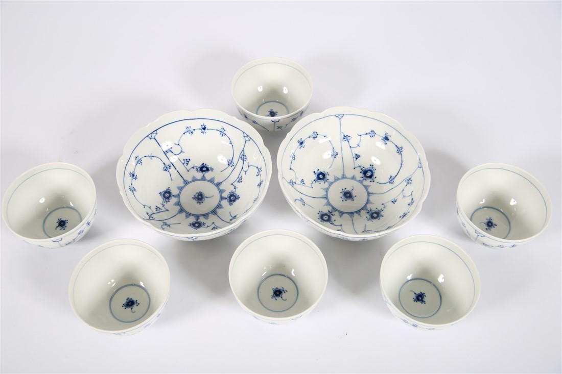 Royal Copenhagen, Blue Fluted Bowls: Royal Copenhagen (Danish, est. 1755). "Blue Fluted Plain" pattern, c. 1968. Designed by Arnold Krog. Model # 209 and # 311. Smaller bowls: Height: 2 3/4", Diameter: 4 3/4". Larger bowls: Height: 3 1/4