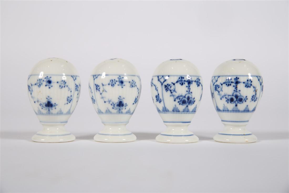 Royal Copenhagen, Blue Fluted Salt and Pepper: Royal Copenhagen (Danish, est. 1755). "Blue Fluted Plain" pattern. Designed by Arnold Krog. Model # 2009, #189. Height: 3", Diameter: 2". Royal Copenhagen two sets of salt and pepper shakers in the Bl