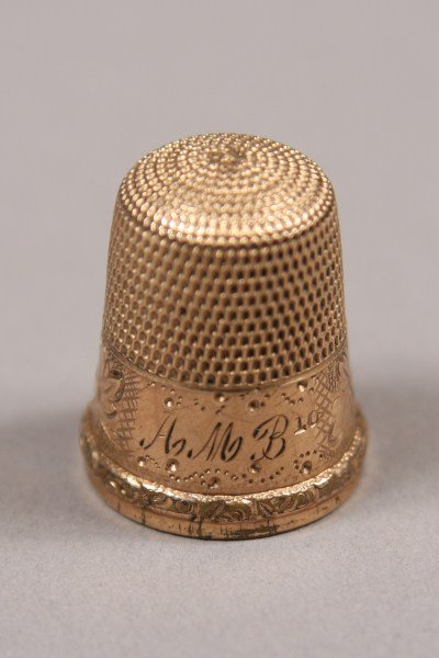 Gold Fill Thimble, Marked "A M B" Stamped "10", Wi: With floral decoration surrounding. Condition: Area with surface loss to interior.