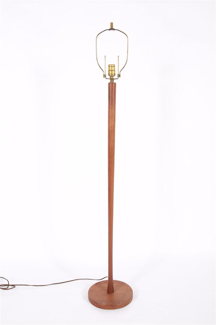 Teak Floor Lamp: Teak. Height: 55 3/4" including harp. Teak floor lamp with no shade. Possibly Danish. Tapering stem form. Functional.